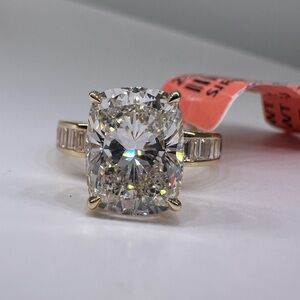 4.02 carat F VVS2 cushion diamond engagement ring baguette band
